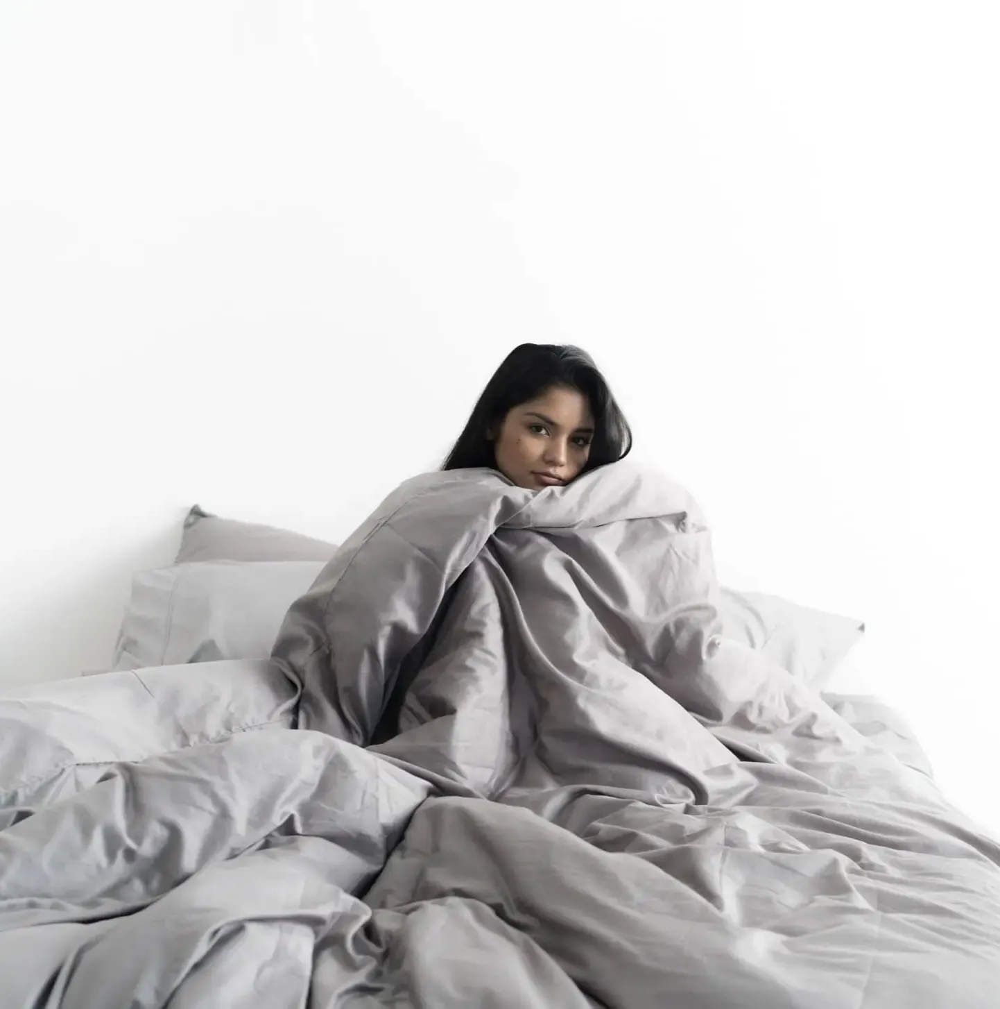 Woman loves the softness of Miracle Made Sheets